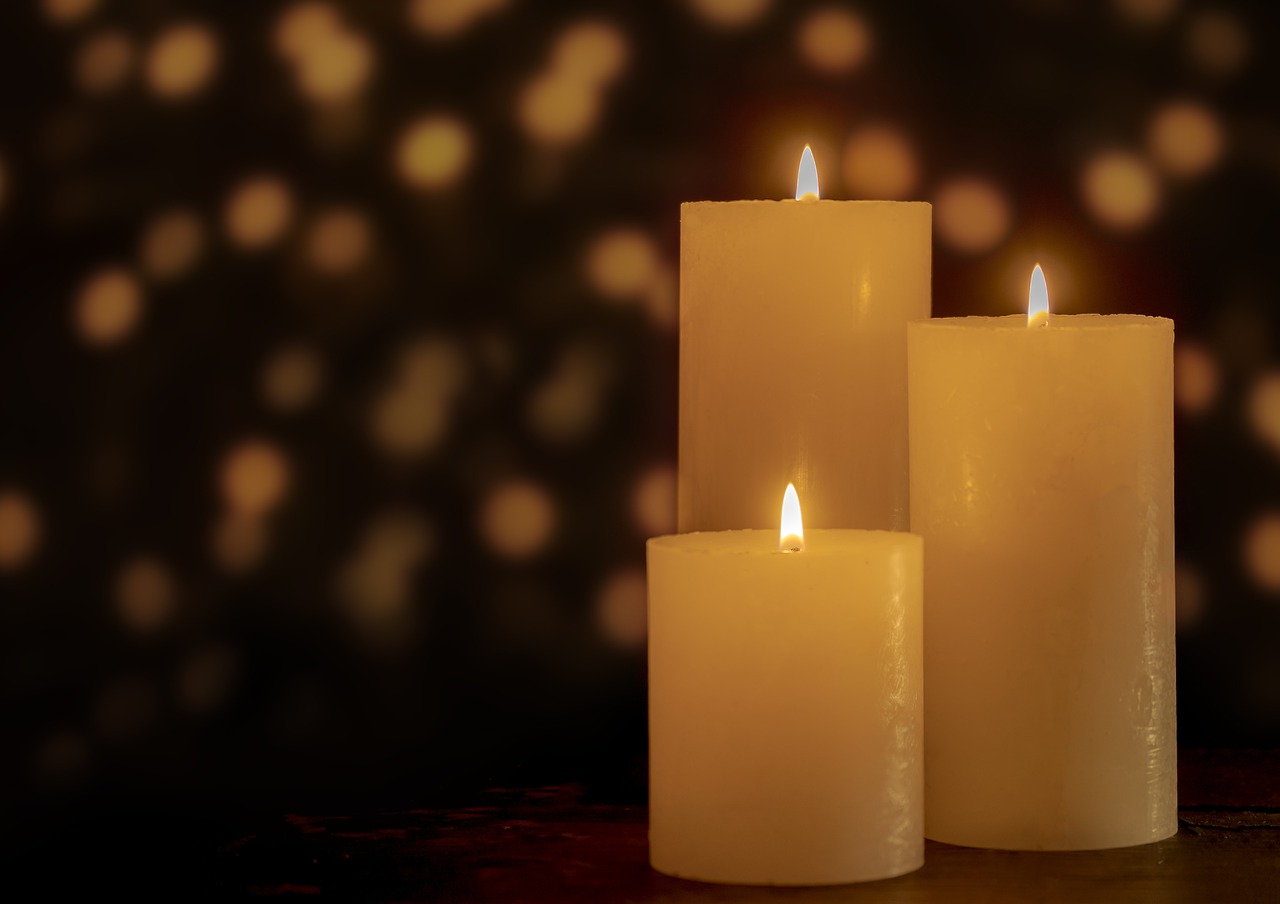three candles burning