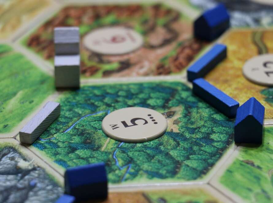 image of board game with little houses and roads